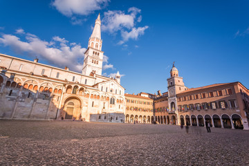 Fototapeta na wymiar Modena, Emilia Romagna, Italy. Piazza Grande at sunset, with Cathedral Duomo and Ghirlandina leaning tower