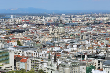 Obraz premium High angle view of Pest with St. Stephen's Basilica in Budapest, Hungary. View from Gellert Hill.