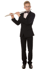 Boy in a suit playing a flute