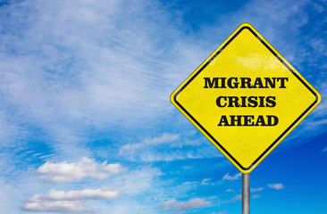 A road sign Migrant Crisis on sky background