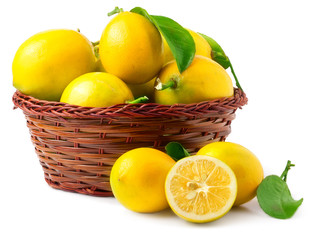 Lemons in basket isolated on white