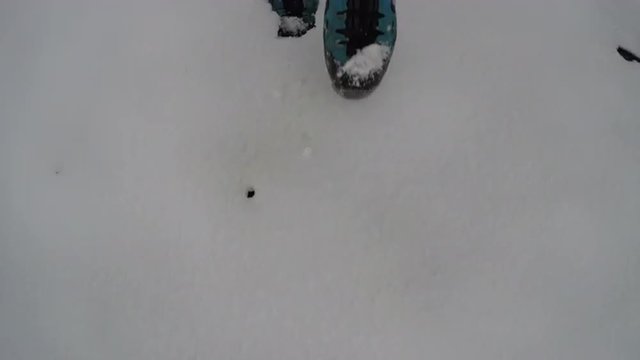 Man walking in snow in winter