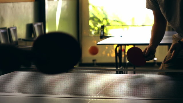 Table tennis (ping pong) indoors,2 men competition slow motion 100fps