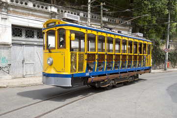 Fototapeta na wymiar Old-fashioned bonde tram stands empty on the streets of Santa Teresa in Rio de Janeiro, Brazil 