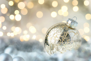 Shiny Christmas bauble and glittering lights