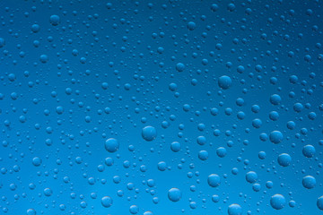 water drop on blue background