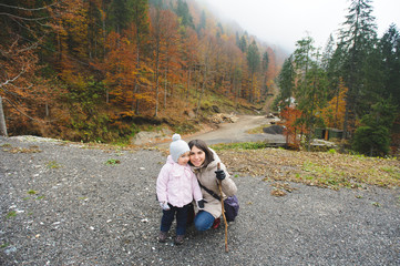 Mother Hugging Daughter