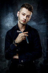 Brutal man with straight razor