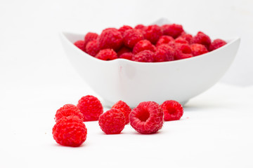 raspberries on white background 