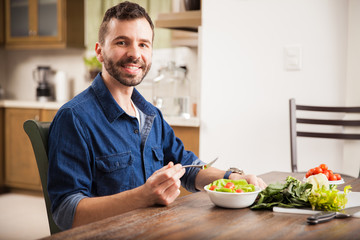 Enjoying a healthy salad at home