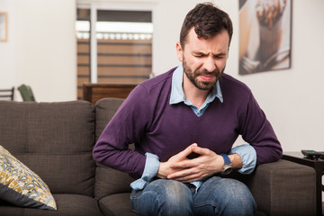 Young man with a stomach ache