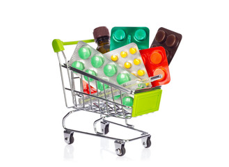 Shopping cart with medication. Isolated on white background