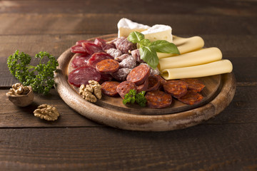 appetizer with cheese and sausages