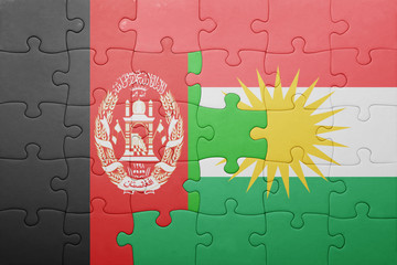 puzzle with the national flag of kurdistan and afghanistan