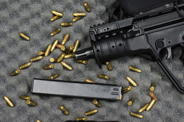 ammunition (bullets) and gun with the weapon holder