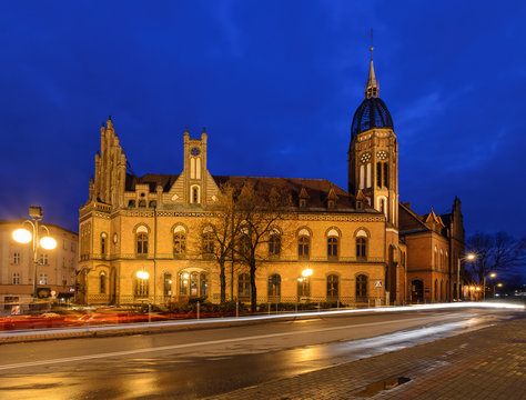 Chorzow post office built in neo-Gothic style in the evening.