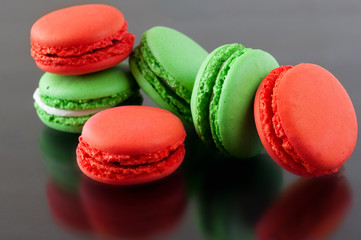 Colorful French Macarons on a dark background. Christmas concept