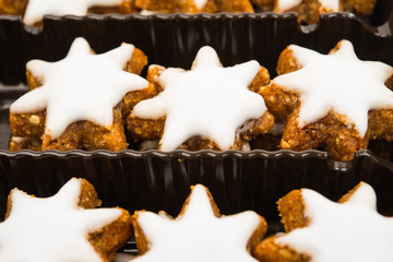 Christmas star shaped cookie with white icing