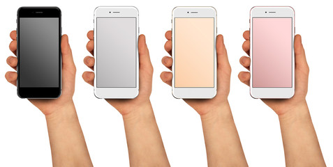 Man holding four phones in different colors. The screen is blank.