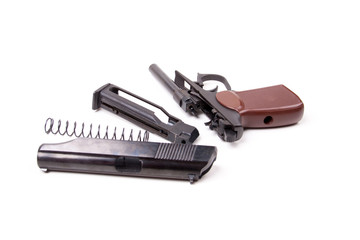 Disassembled gun, isolated