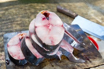 pieces of king mackerel fish after dissection