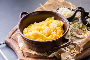 Decorated bowl with boiled couscous with mushroom and cheese
