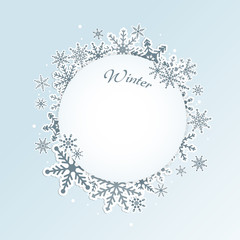 Winter light blue circle frame background with snowflakes