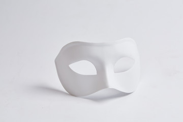 white venetian mask on a white background