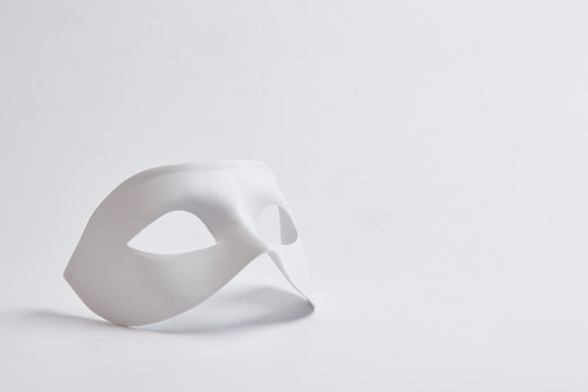 white venetian mask on a white background