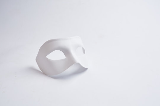 white venetian mask on a white background
