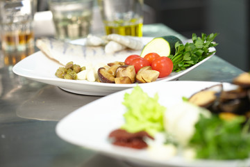 ingredients for a salad with fish and vegetables