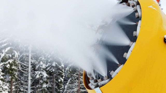 Snow machine gun on a ski slope.
