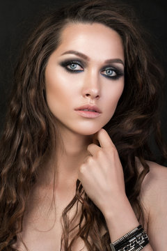 Close-up portrait of a young girl with fashion creative make-up