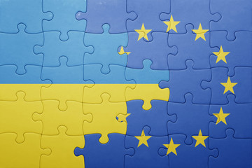 puzzle with the national flag of ukraine and european union