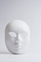 white venetian mask on a white background