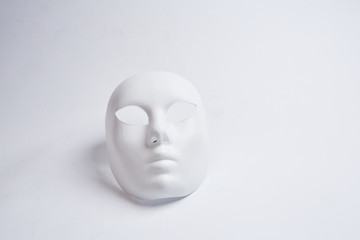 white venetian mask on a white background