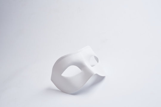 white venetian mask on a white background