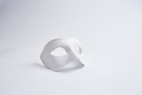white venetian mask on a white background