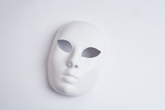 white venetian mask on a white background