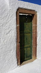 door in small greece village exo gonia on santorini