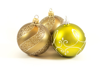 Three golden christmas balls