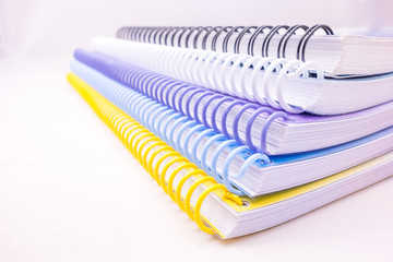 color ring of notebooks stacked