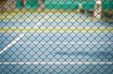 net/steel net of green Tennis court.