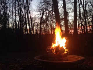 fire pit burning flame at dusk