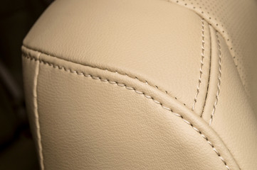 Business car leather seat background. Interior detail.