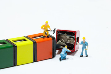Under construction and teamwork concept - construction workers performing repair broken parts