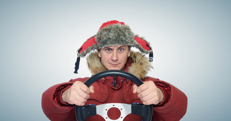 Funny man winter driving, car drive concept