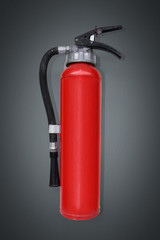 Fire extinguisher on grey