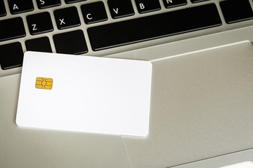 Blank Credit Card With Electronic Chip On Laptop