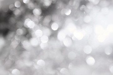 Abstract bokeh lighting background , silver color tone
